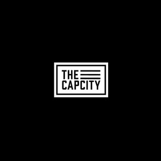 The Cap City logo